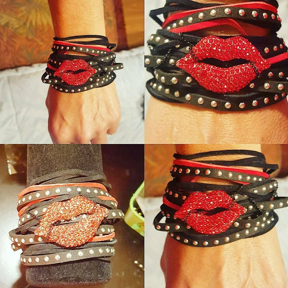 Black and red studded wrap bracelet with a sparkling red lips centerpiece